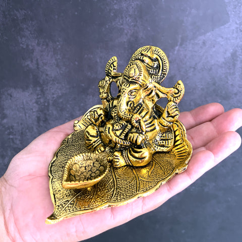 Lord Ganesha with Diya