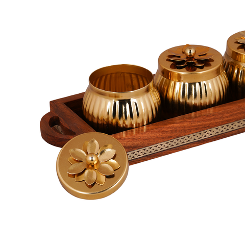 wooden tray with metal jars